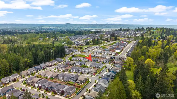 A bird's-eye view highlights the community's thoughtful design and surrounding natural beauty.