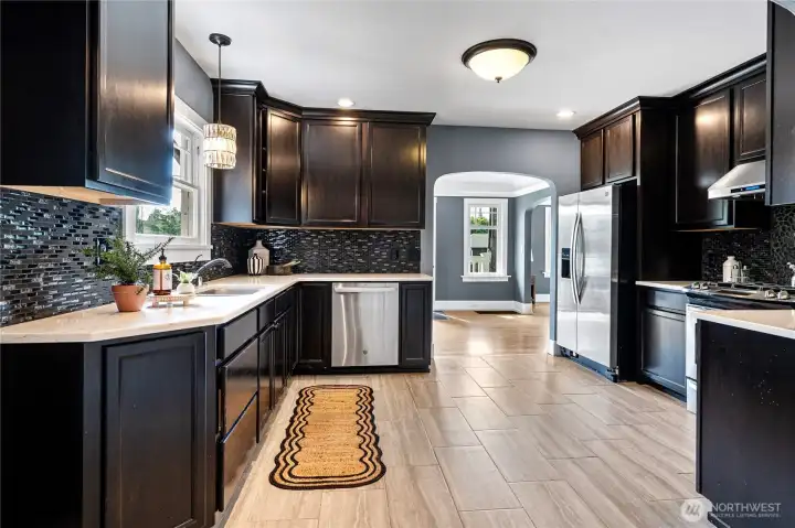 Updated kitchen with stainless appliances and ample storage