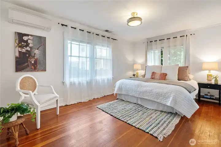 Larger of two main floor bedrooms with supplemental ductless mini-split