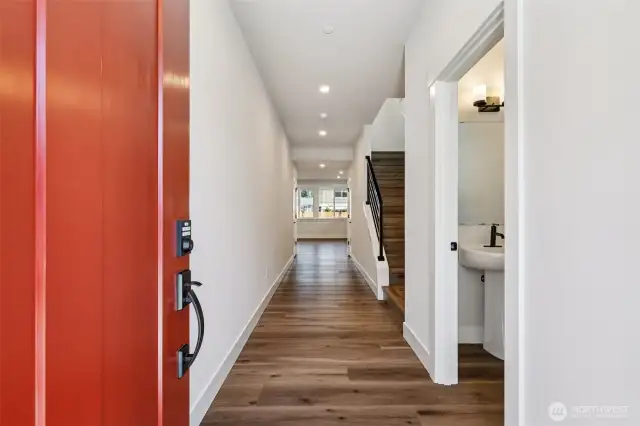 Inviting entry showcases 9ft. ceilings throughout the home.