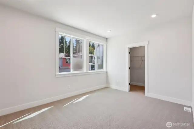 4th bedroom features a walk-in closet and can easily function as a sizable bonus room.