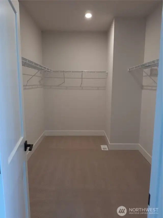 Extra large primary closet is ready to be filled.