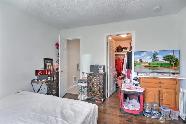 Primary bedroom has walk-in closet and own full bath