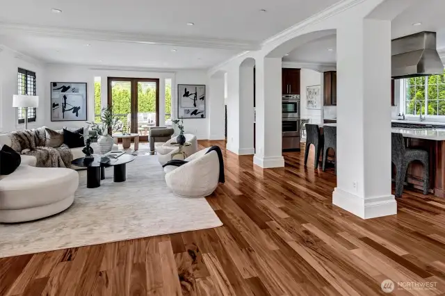 Beautiful arches and custom millwork show off and accentuate this open concept plan perfect for modern living and entertaining!