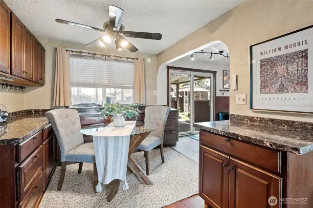 Casual dining between Kitchen and Living Room.