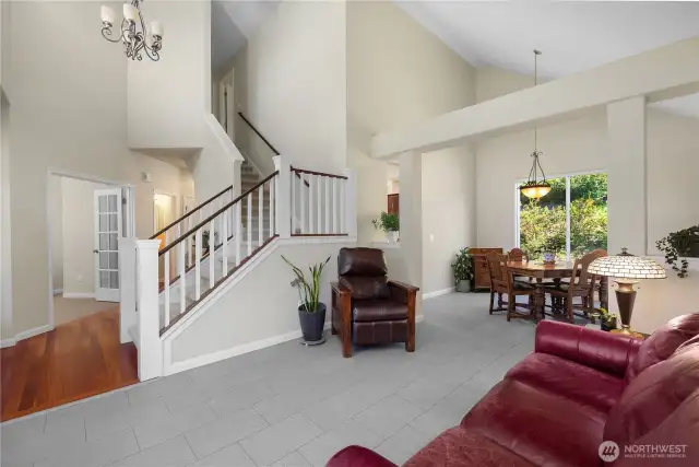 Living Room looking toward Dining Room, both with Luxury Vinyl flooring.