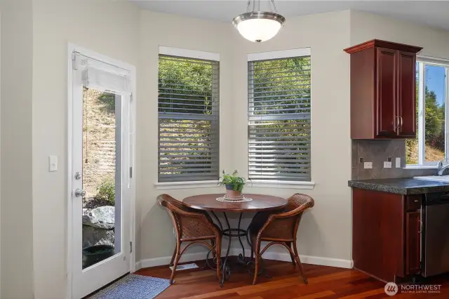 Space for a table just off kitchen, with door to back patio and tons of natural light.