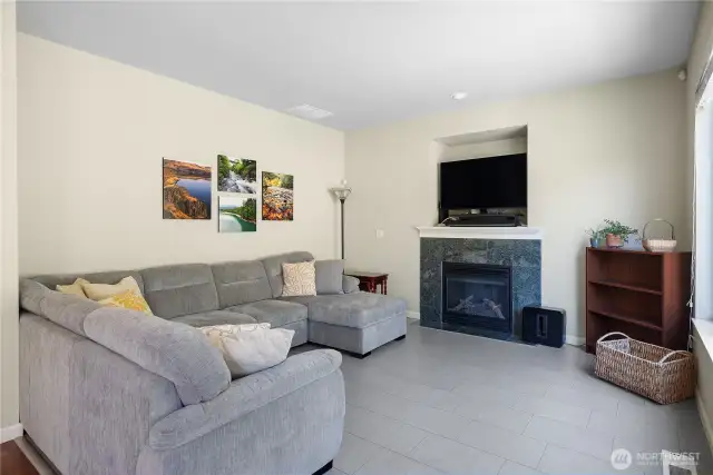 Family Room is large enough for big sectional. LVP flooring and cozy gas fireplace!