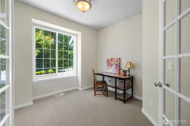 French doors to Den/Office with lots of light and new carpet. Perfect for working from home, hobbies, separate TV room, playroom, etc.
