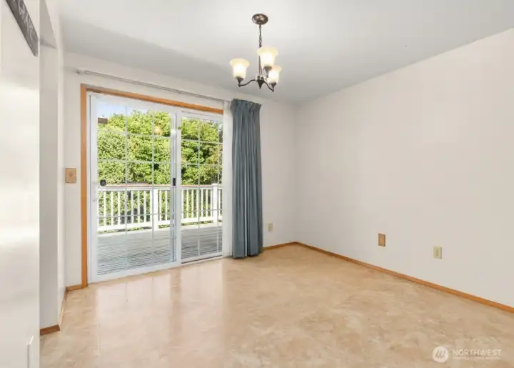 Dining room has slider leading out to the back deck
