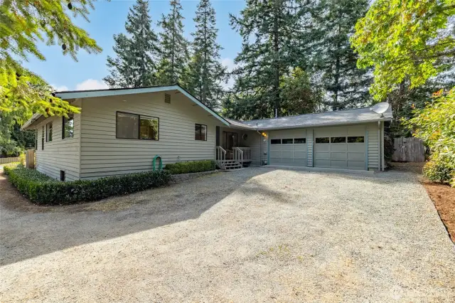 House with two car garage. Solid Cedar Siding