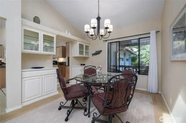 Dining room has built in cabinets for dishes and glassware.