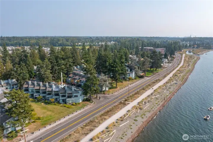 PRIME location, 2nd row, across from the beach, with bay views from both sides of the condo.