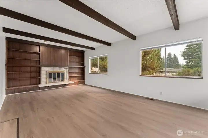 Cozy fireplace and new flooring