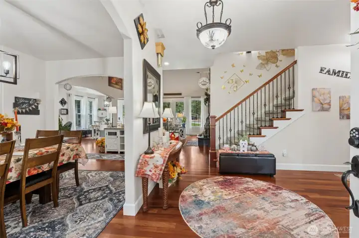 Foyer with brazillian cherry hardwoods in entry and living room