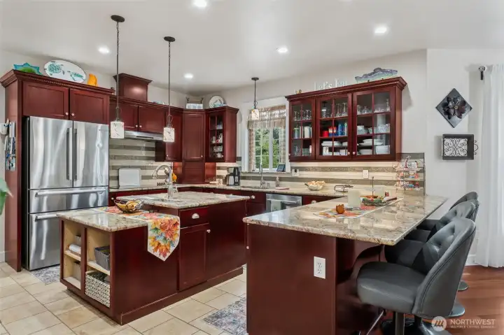 Chef's kitchen with kitchen eating bar
