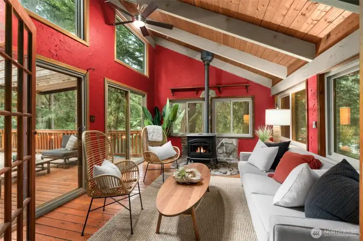 Sunroom with Cozy Fireplace and Vaulted Ceilings