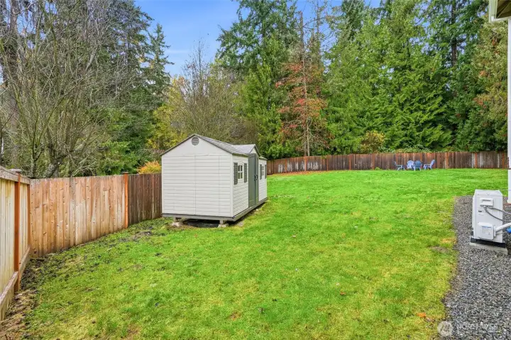 View from gate to backyard. Left side of home