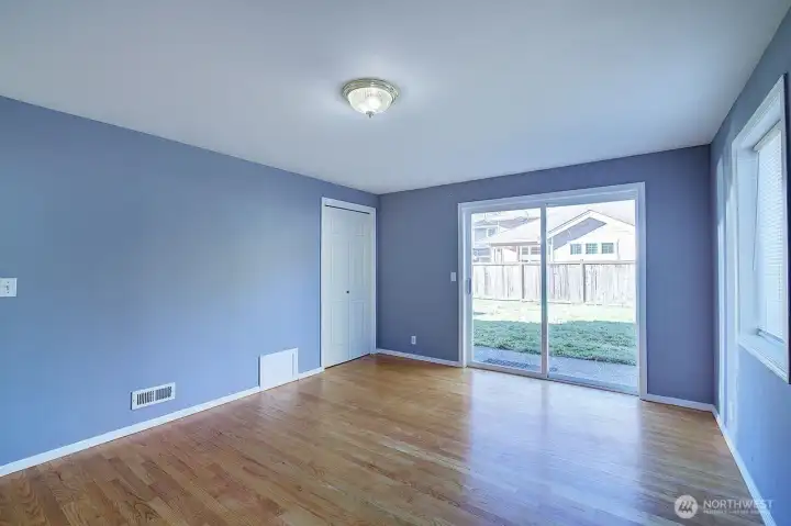 Lower level bedroom #6 with sliders to backyard.