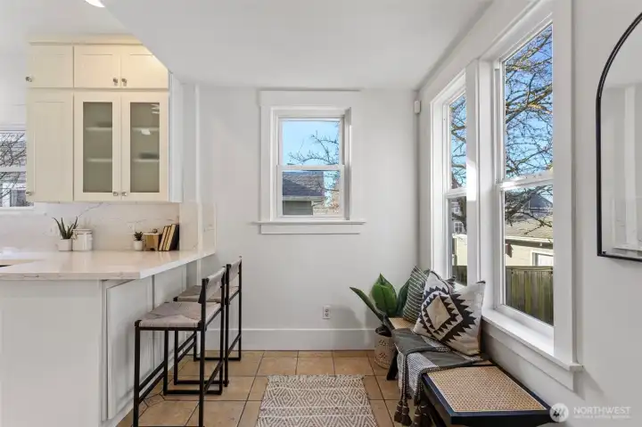 Behind the kitchen is a nice big mud room area where you can have benches and hooks to shed your coats and shoes.