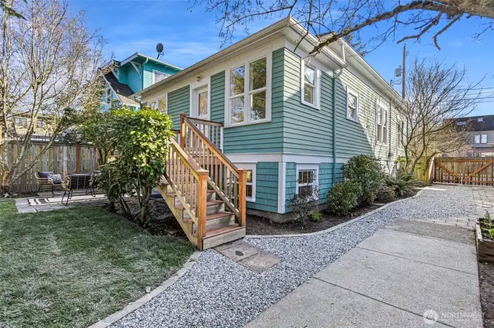 Looking from garage, down driveway to street.