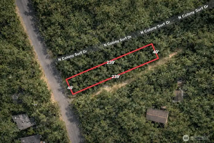 Not a survey. Overhead view with approximate boundaries in red along with approximate dimensions.