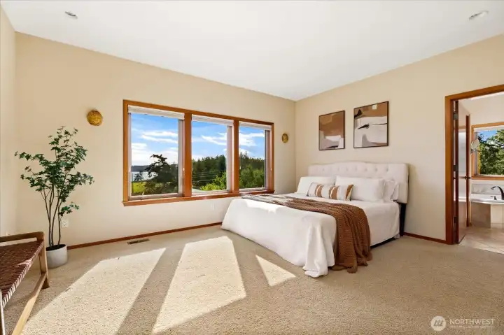 The large windows allow light from every angle with no neighbors in sight.