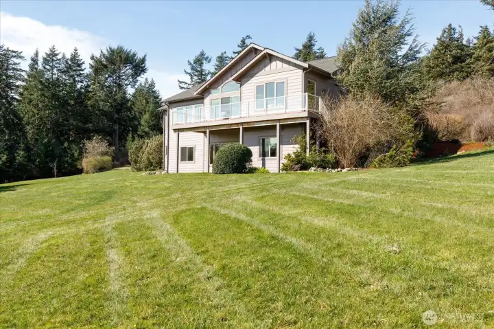 Privacy all around with native landscaping that is easy to maintain.