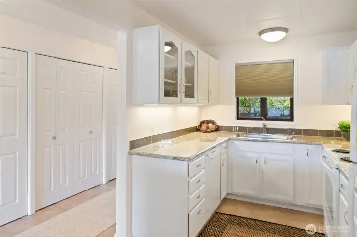 The doors to the left house the washer, dryer, and storage for brooms, etc. There again all is inclusive.