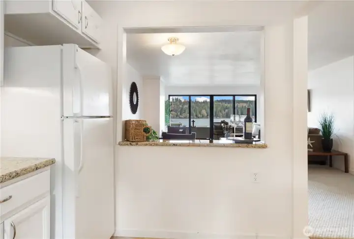 The chef can see the water,guests, and diners.