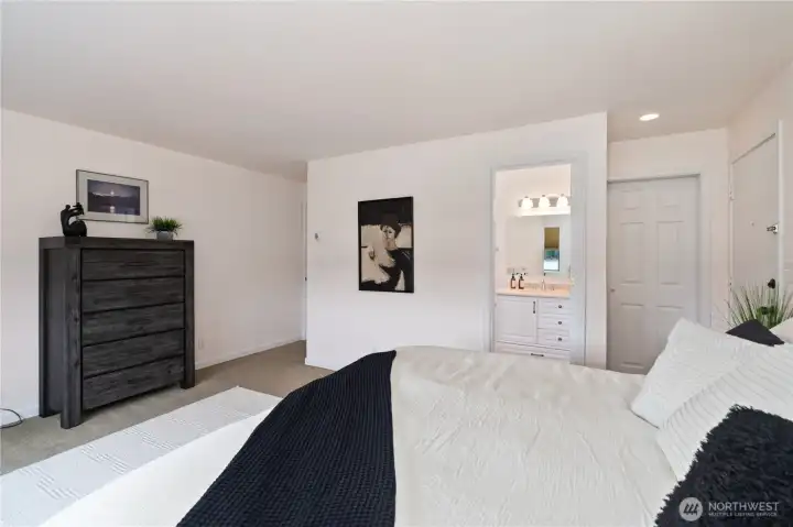 King size bed, tiled floor in bath.