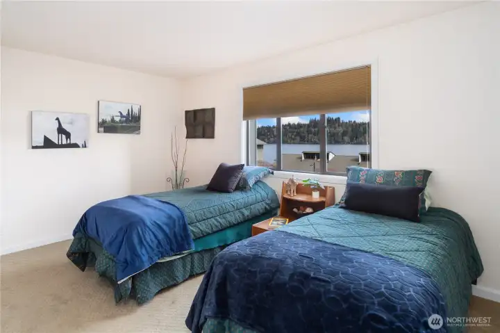 The bedroom has twin beds and great storage.