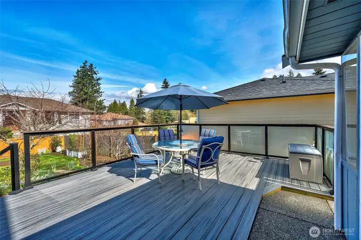 Relax and enjoy your gorgeous yard on your new Trex deck where there is always something new in bloom!