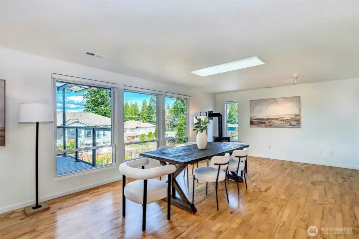 Expansive dining area with vented skylight for maximum light and To catch that perfect summer breeze.