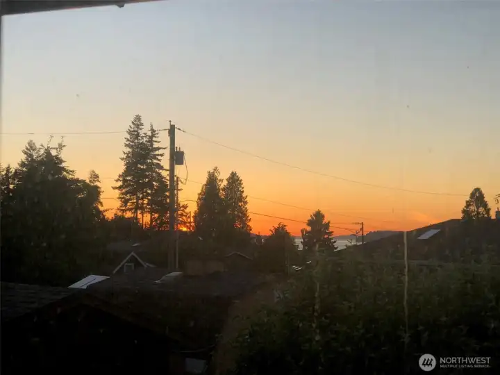 But don't forget the night views! Whether dining indoors or relaxing on the deck, these vibrant evening views provide a stunning backdrop to your nightly routine.