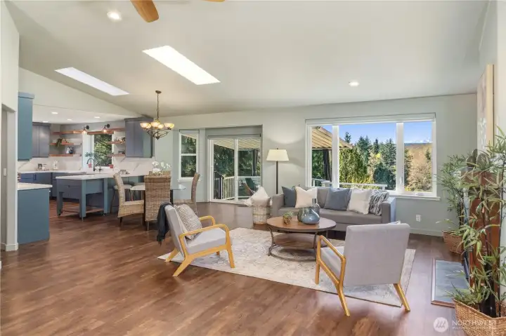 Great room with a mountain view and a propane fireplace.