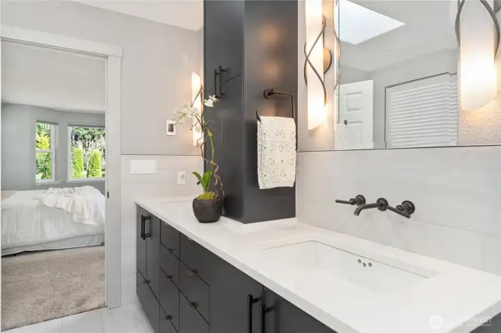 Just off the primary is the eloquent primary bathroom.