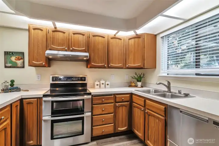 Kitchen has upgraded appliances.  Fisher & Paykel refrigerator, double door dishwasher also Fisher & Paykel and double over.  Freashly painted.  Lots of storage space.