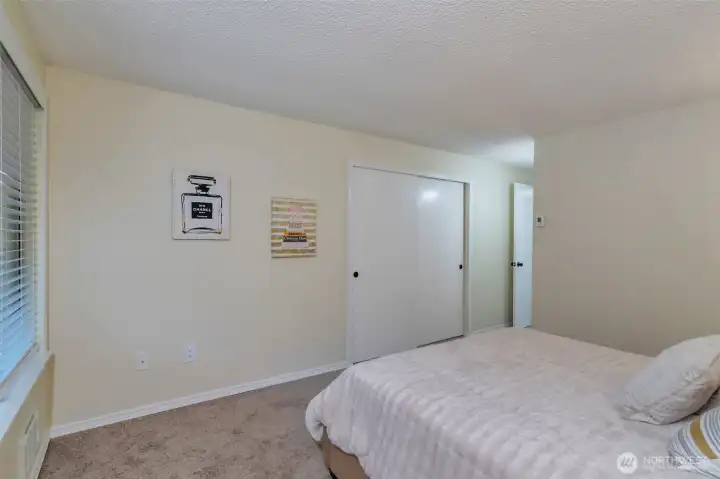 View of closet in master bedroom.