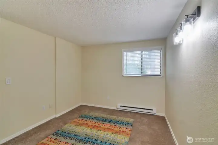 2nd bedroom has good lighting, freshly painted and good closet space.