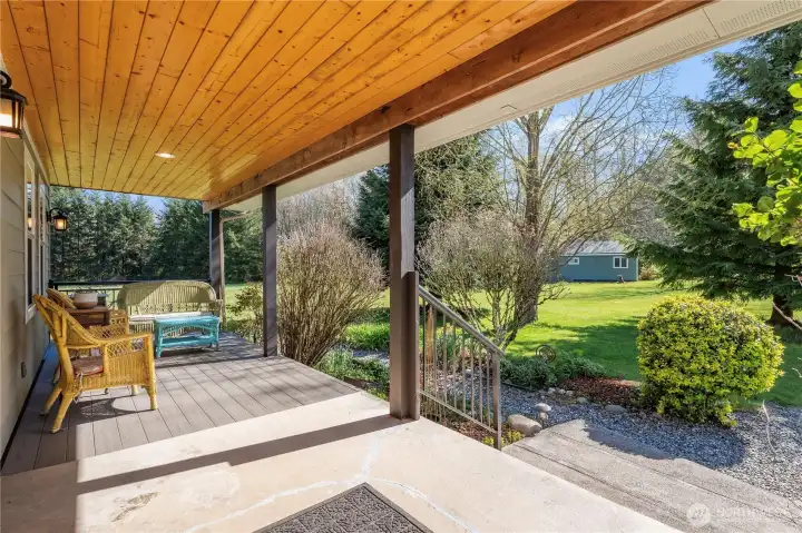 Covered front porch and a permitted DADU (Detached Accessory Dwelling Unit) is the green cabin. Ask lender about using 75% of potential rental income to help qualify you.