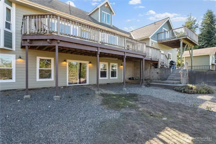 Lower entrance to Daylight basement. Lower area has one finished office space/room, is rough plumbed with most fixtures, is framed and just needs some sweat equity and it could be an ADU or multigenerational living.