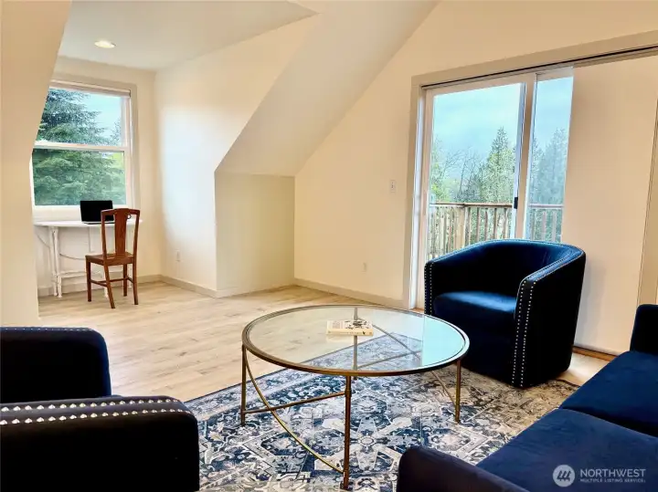 This space has 2 dormer windows, a beautiful 3/4 bath (pictures coming soon) and an area for a small kitchen that is rough plumbed.