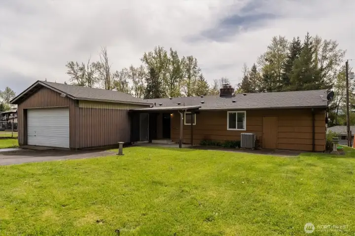 Back of home with 2 car garage. Back of home with 2 car garage.