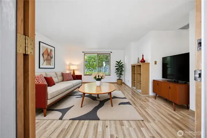 The rooms are spacious and the floors are laminate (over the original hardwood floors).