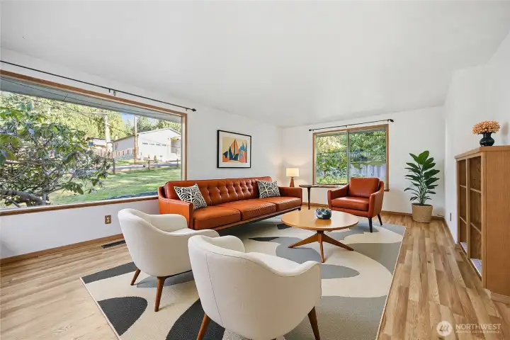 The living room is generously sized and the windows allow so much natural sunlight.