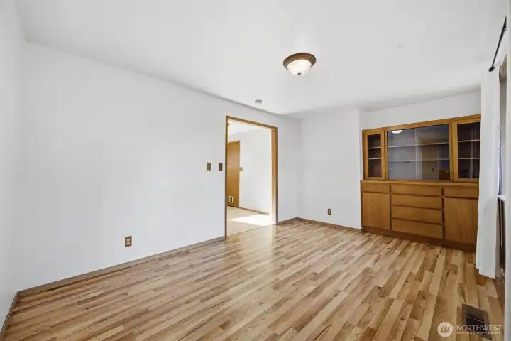 The dining room is well defined and has a built-in buffet/cabinet that is in immaculate condition.