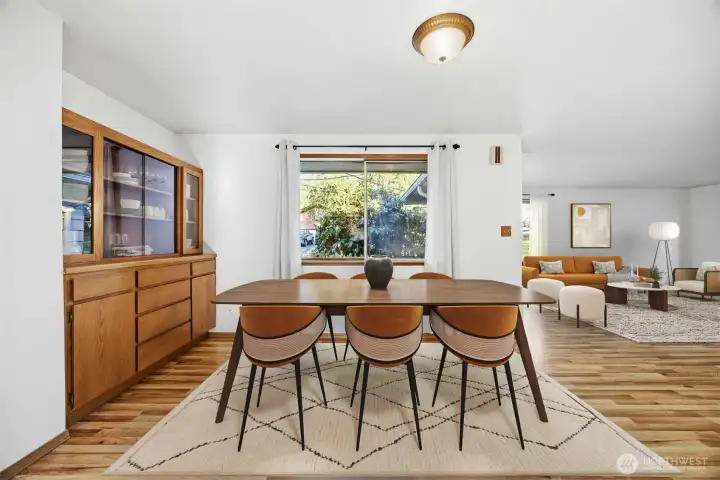 Looking across the large dining room toward the living room and entry.