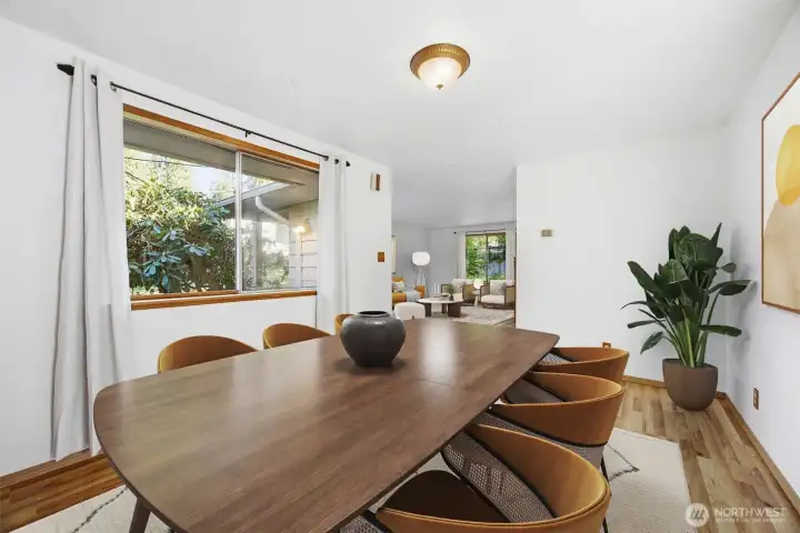 Looking from the spacious dining room toward the large living room beyond.