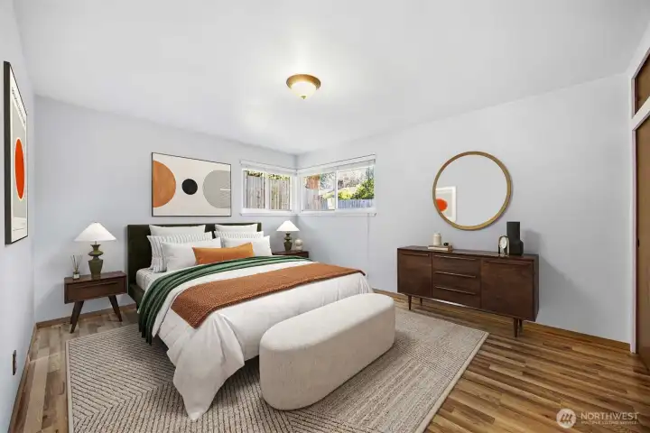 The primary bedroom is generously sized and looks to the rear yard.